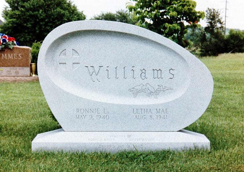 Williams Custom Shaped Headstone with Bird Carving